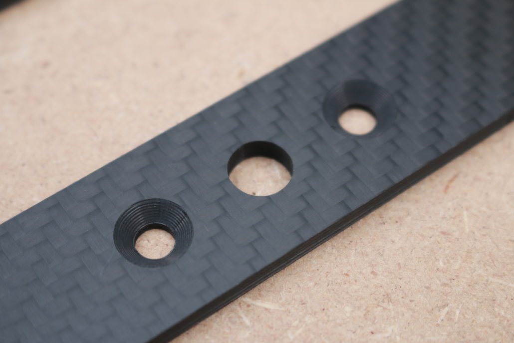 Drill holes with counterbores in carbon fibers Drill holes with counterbores in carbon fibers