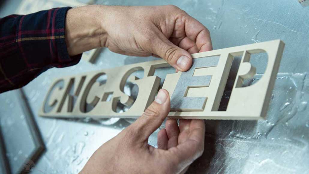 Lettering-in-ceramic-tile-Water-Jet-cut Lettering in ceramic tile Water Jet cut