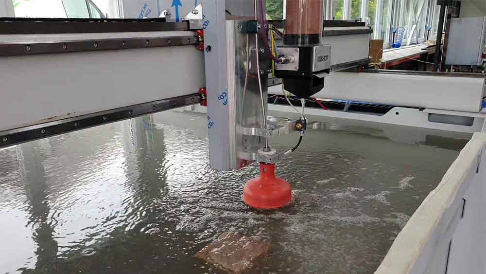 Water Jet cutting of 60mm natural stone Water Jet cutting of 60mm natural stone