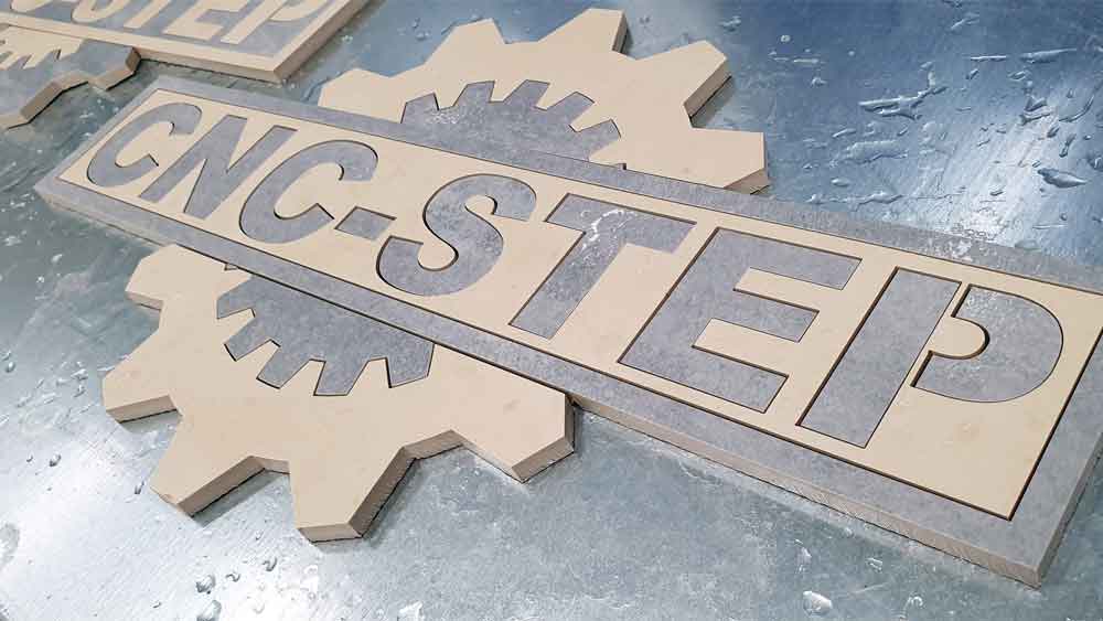 flowJET Water Jet Cutter cuts two coloured ceramic tiles flowJET Water Jet Cutting of two coloured ceramic tiles