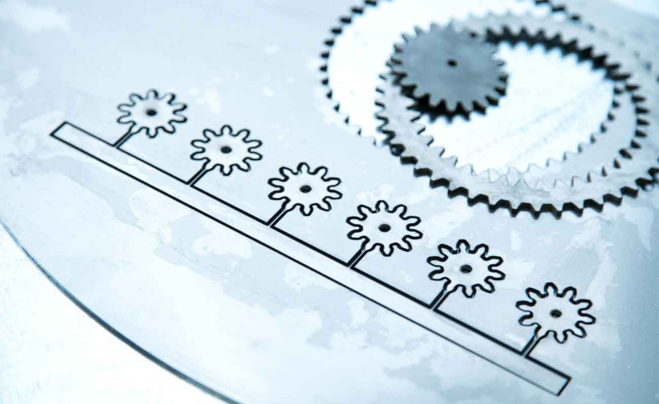 Gear wheels cut into stainless steel sheet on the Water Jet Cutting Machine Gear wheels cut into stainless steel sheet on the Water Jet Cutting Machine